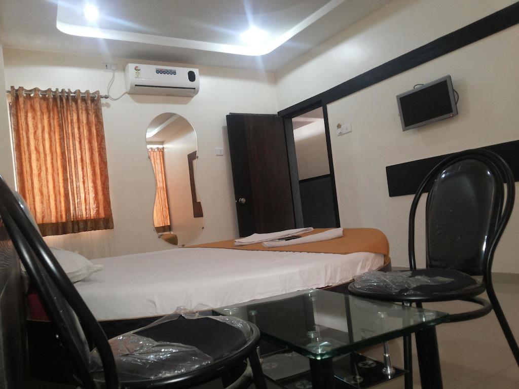Hotel Sai Galaxy Inn Shirdi Quarto foto