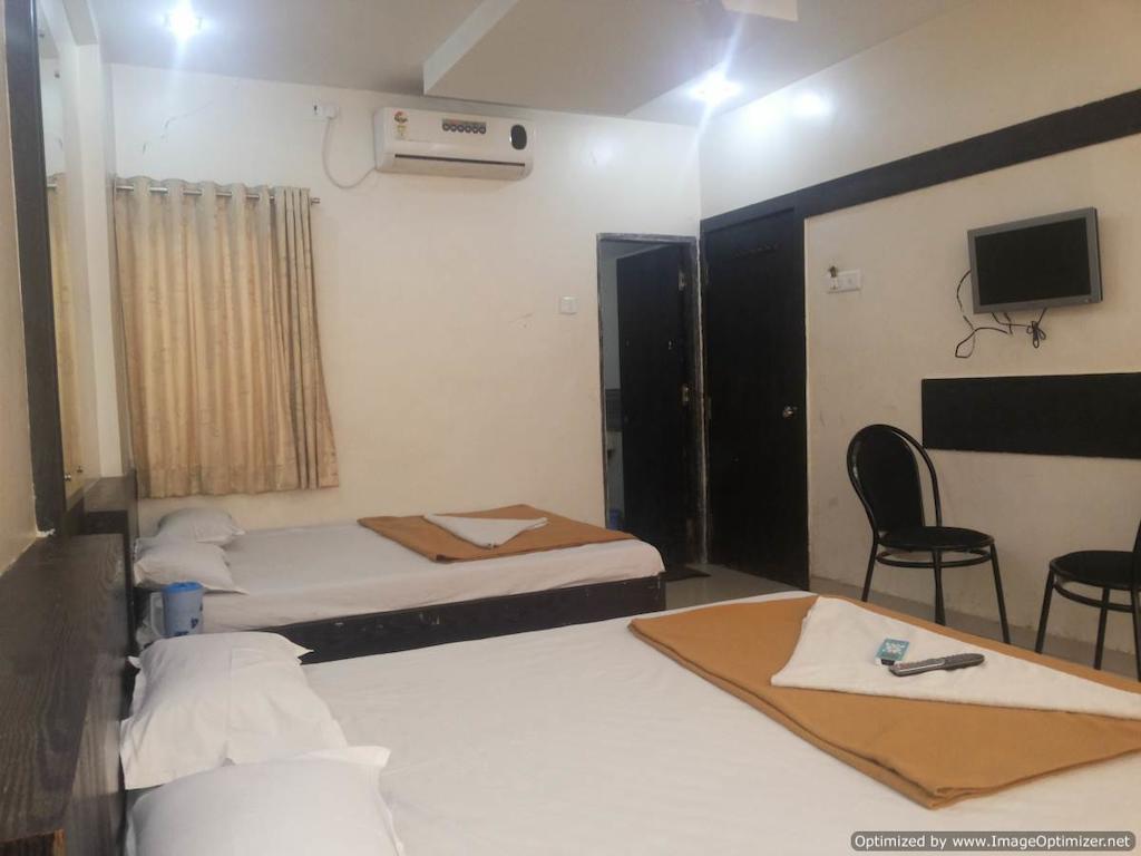 Hotel Sai Galaxy Inn Shirdi Quarto foto